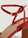 Red heeled sandals in woven leather
